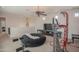 Open loft area with home gym and access to a balcony at 17808 N 57Th Pl, Scottsdale, AZ 85254