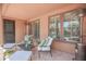 Cozy covered patio with comfortable seating and outdoor heaters at 17808 N 57Th Pl, Scottsdale, AZ 85254