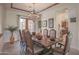 Formal dining room features a large wood table and chandelier at 17808 N 57Th Pl, Scottsdale, AZ 85254