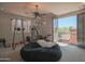 Home gym in a bright loft space with access to a private balcony at 17808 N 57Th Pl, Scottsdale, AZ 85254