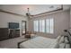 Primary bedroom with king bed, private access and carpet flooring at 17808 N 57Th Pl, Scottsdale, AZ 85254