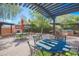 Outdoor patio with pergola, fireplace, and seating at 17808 N 57Th Pl, Scottsdale, AZ 85254
