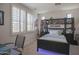 Bedroom with built-in shelving and window seating at 17808 N 57Th Pl, Scottsdale, AZ 85254