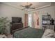 Second bedroom with a queen-size bed and ensuite bathroom at 17808 N 57Th Pl, Scottsdale, AZ 85254