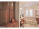 Bathroom with a large soaking tub and and sinks at 17808 N 57Th Pl, Scottsdale, AZ 85254
