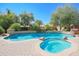 Inviting pool and spa with waterfall feature at 17808 N 57Th Pl, Scottsdale, AZ 85254