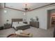 Spacious Primary bedroom with a king-size bed and ensuite bathroom at 17808 N 57Th Pl, Scottsdale, AZ 85254