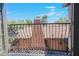 View from private balcony overlooking neighboring homes and landscape at 17808 N 57Th Pl, Scottsdale, AZ 85254