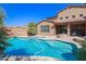 Relaxing pool and spa surrounded by a large patio and lush landscaping at 17808 N 57Th Pl, Scottsdale, AZ 85254