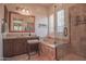 Bathroom with soaking tub, walk-in shower, and double vanity at 17808 N 57Th Pl, Scottsdale, AZ 85254