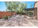 Outdoor patio with pergola, fireplace, and seating at 17808 N 57Th Pl, Scottsdale, AZ 85254