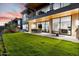 Spacious backyard with grassy area and view of modern home at 6311 E Phoenician Blvd # 21, Scottsdale, AZ 85251