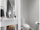 Modern bathroom with marble vanity and white toilet at 6311 E Phoenician Blvd # 21, Scottsdale, AZ 85251