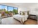 Spacious bedroom with large windows and comfortable bed at 6311 E Phoenician Blvd # 21, Scottsdale, AZ 85251