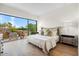 Bright bedroom with large windows and comfortable bed at 6311 E Phoenician Blvd # 21, Scottsdale, AZ 85251