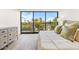 Main bedroom with sliding glass doors opening to a view at 6311 E Phoenician Blvd # 21, Scottsdale, AZ 85251