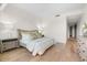 Comfortable bedroom with light wood flooring and dresser at 6311 E Phoenician Blvd # 21, Scottsdale, AZ 85251