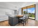 Modern kitchen with island, high-end appliances and views of the golf course at 6311 E Phoenician Blvd # 21, Scottsdale, AZ 85251