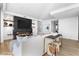 Living room with fireplace, built-in shelving, and large TV at 6311 E Phoenician Blvd # 21, Scottsdale, AZ 85251