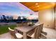Outdoor patio with large table and chairs, offering sunset views at 6311 E Phoenician Blvd # 21, Scottsdale, AZ 85251