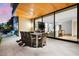 Patio with large table and chairs, overlooking living room at 6311 E Phoenician Blvd # 21, Scottsdale, AZ 85251