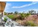 Relaxing patio with seating and a view of the golf course at 6311 E Phoenician Blvd # 21, Scottsdale, AZ 85251