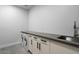 Bright laundry room with modern washer, dryer, and ample counter space at 6311 E Phoenician Blvd # 21, Scottsdale, AZ 85251