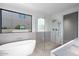 Elegant bathroom featuring a soaking tub and a glass-enclosed shower at 6311 E Phoenician Blvd # 21, Scottsdale, AZ 85251