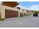 Modern garage doors and well-lit parking area at 6311 E Phoenician Blvd # 21, Scottsdale, AZ 85251