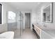 Modern bathroom with double sinks, a large shower, and a free-standing tub at 6311 E Phoenician Blvd # 21, Scottsdale, AZ 85251