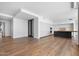 Modern kitchen with sleek cabinetry, large island, and hardwood floors at 6311 E Phoenician Blvd # 21, Scottsdale, AZ 85251