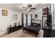 Spacious bedroom with ceiling fan and ample closet space at 649 N 67Th Dr # 25, Phoenix, AZ 85043