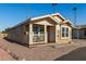Tan home with carport and small front porch at 649 N 67Th Dr # 25, Phoenix, AZ 85043