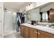 Clean bathroom with double sinks and a large shower at 649 N 67Th Dr # 25, Phoenix, AZ 85043