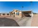 Tan home with carport and small front porch at 649 N 67Th Dr # 25, Phoenix, AZ 85043