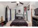 Serene bedroom featuring a cozy bed and large window at 649 N 67Th Dr # 25, Phoenix, AZ 85043