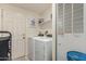 Laundry room with washer, dryer, and extra storage at 649 N 67Th Dr # 25, Phoenix, AZ 85043