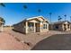 Tan home with carport and small front porch at 649 N 67Th Dr # 25, Phoenix, AZ 85043