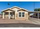Charming single-wide manufactured home with covered porch at 649 N 67Th Dr # 25, Phoenix, AZ 85043