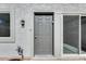 Gray front door with sidelights and a small patio at 1045 N Granite Reef Rd, Scottsdale, AZ 85257
