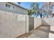 Private backyard access with a gated entry and brick wall at 1045 N Granite Reef Rd, Scottsdale, AZ 85257