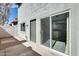 Private patio with sliding glass door leading to interior at 1045 N Granite Reef Rd, Scottsdale, AZ 85257