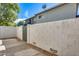 Private backyard access with a gated entry and brick wall at 1045 N Granite Reef Rd, Scottsdale, AZ 85257