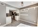Dining area with white cabinets and gray brick feature wall at 1045 N Granite Reef Rd, Scottsdale, AZ 85257
