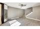Living room with gray walls, hardwood floors, and a staircase at 1045 N Granite Reef Rd, Scottsdale, AZ 85257