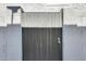 Gray wooden gate with the number 1045 at 1045 N Granite Reef Rd, Scottsdale, AZ 85257