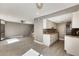 Open kitchen with granite countertops and white cabinets at 1045 N Granite Reef Rd, Scottsdale, AZ 85257