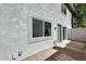 Exterior view of back of house with patio and door at 1045 N Granite Reef Rd, Scottsdale, AZ 85257