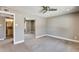 Bedroom with mirrored closet and access to bathroom at 1045 N Granite Reef Rd, Scottsdale, AZ 85257
