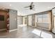 Bright living room with hardwood floors and sliding glass door at 1045 N Granite Reef Rd, Scottsdale, AZ 85257
